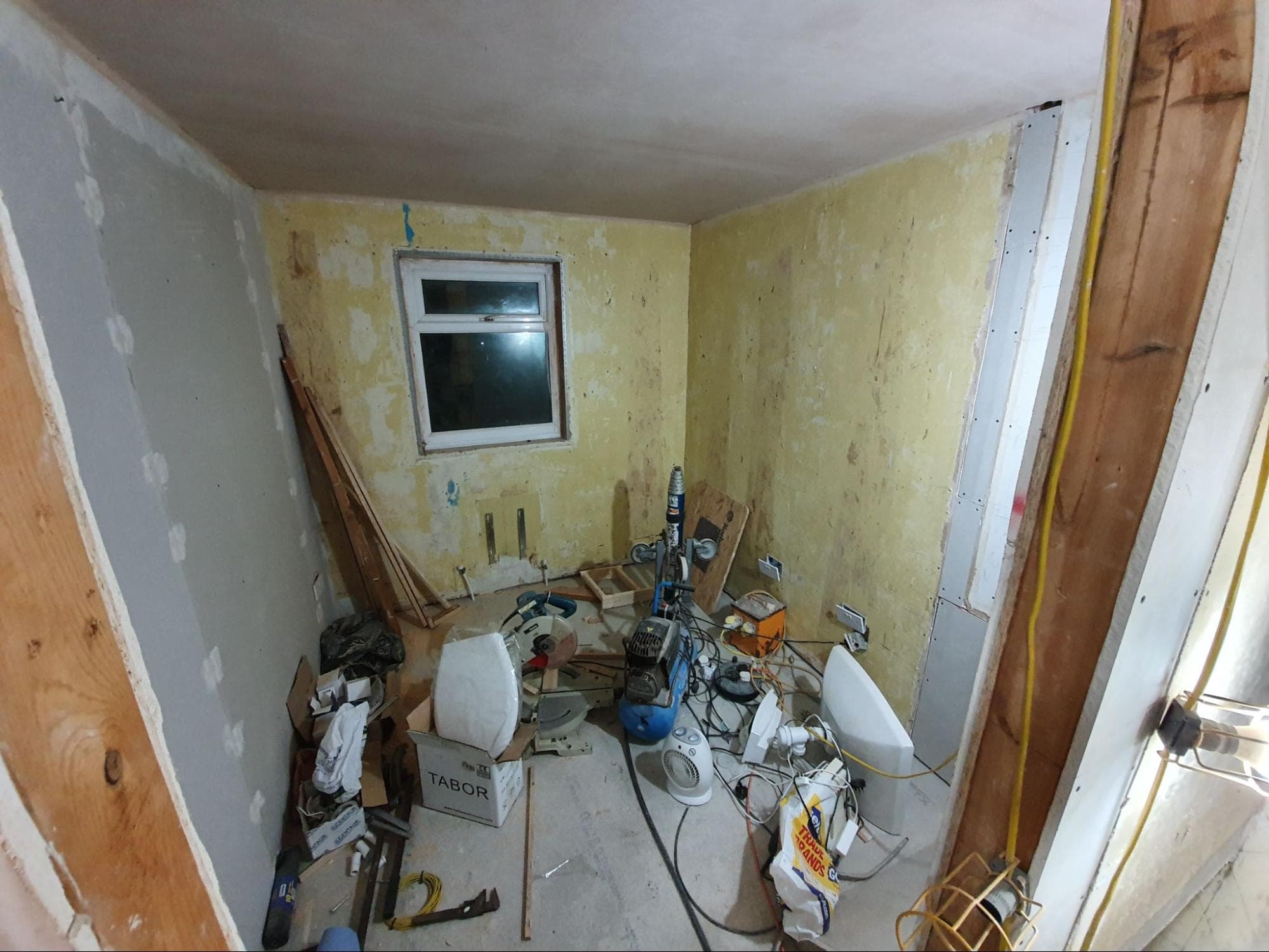 You can just make out in this picture where I’ve moved walls and altered the bulkhead over the stairs to open up more space in the box room. The ceiling has been over-boarded and plastering has begun but the ‘tool chaos’ you see was an ongoing issue!